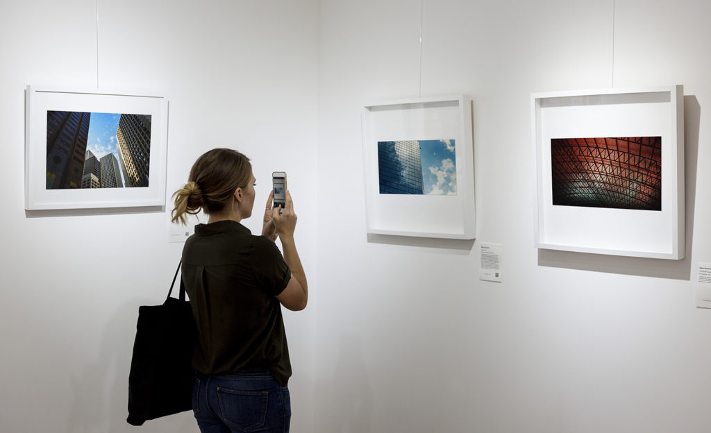 Woman visiting a local art exhibit