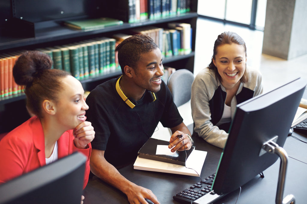 College students study in the library WhirLocal